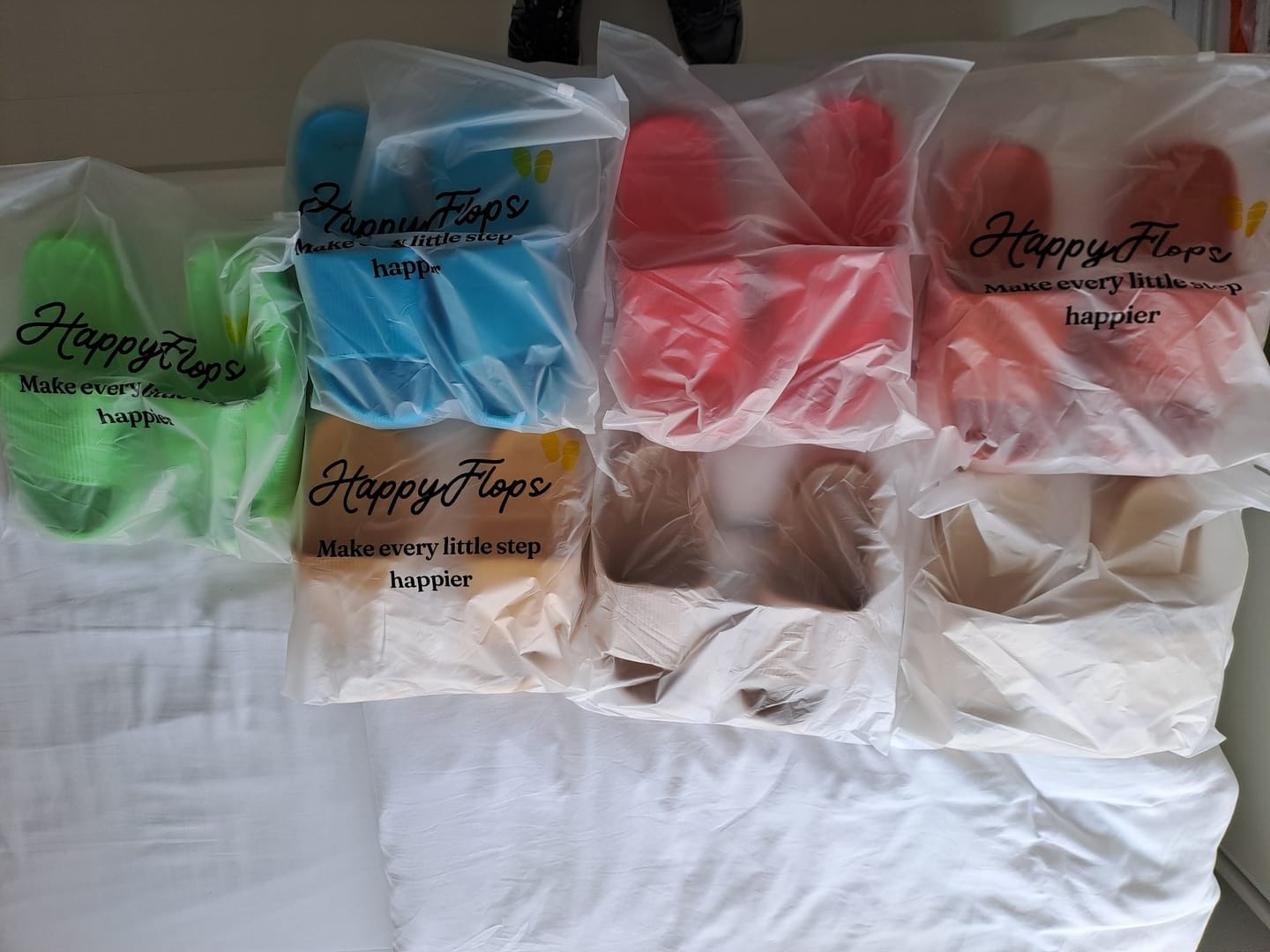 Verschillende kleuren HappyFlops in verpakking